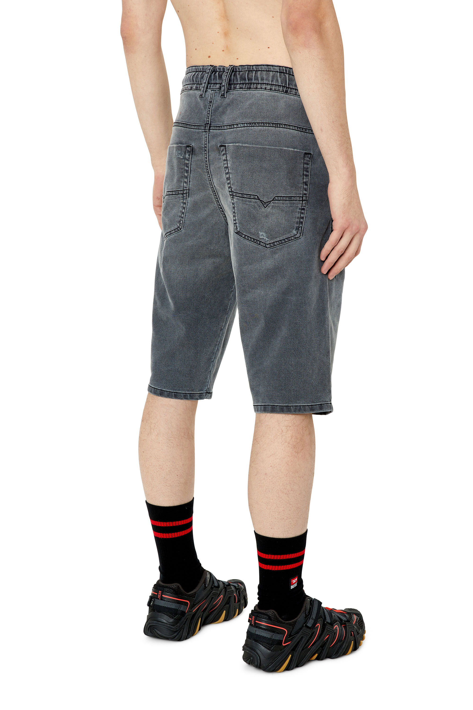 W40 ディーゼル KROOSHORT-NE DENIM SHORT JOG D-KROOSHORT-Z JOGGJEANS Man: Ripped shorts in Track Denim