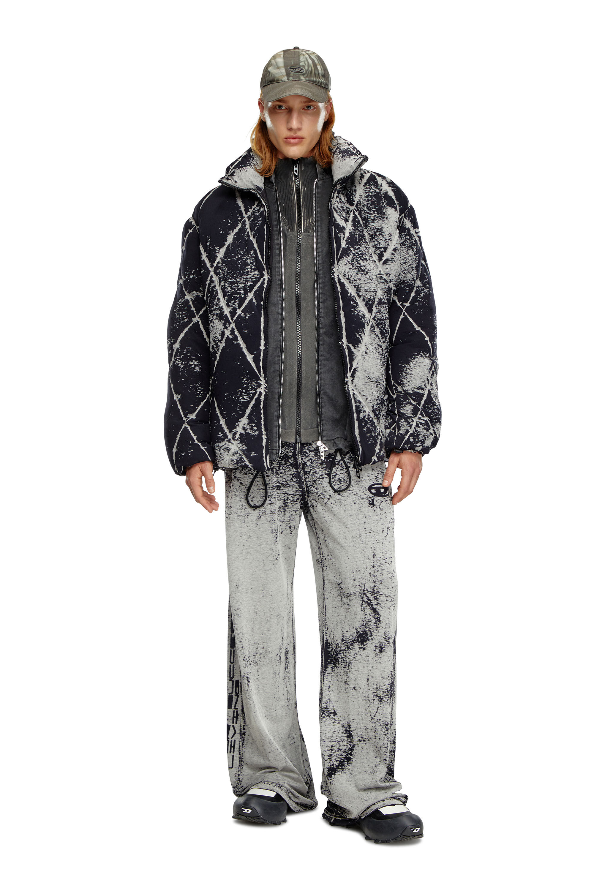 Diesel - W-MARCEL, Male's Puffer jacket in burn-out jersey in Black - 1