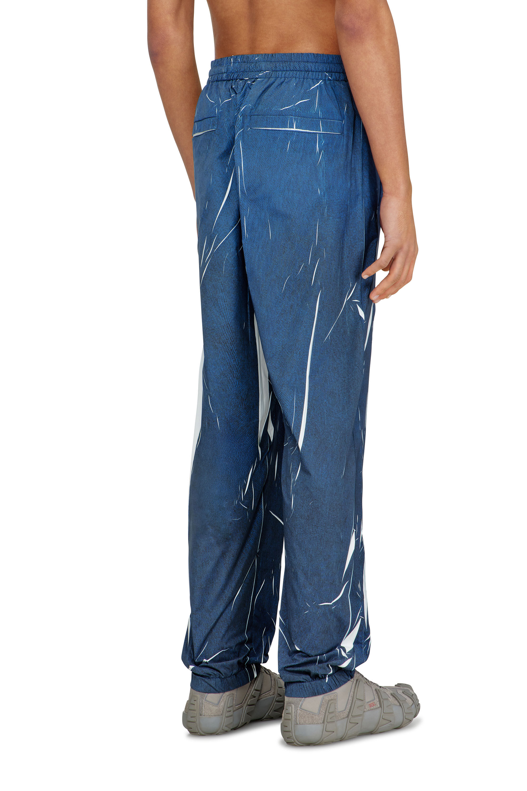 Men's Light track pants with denim-effect print | Blue | Diesel US