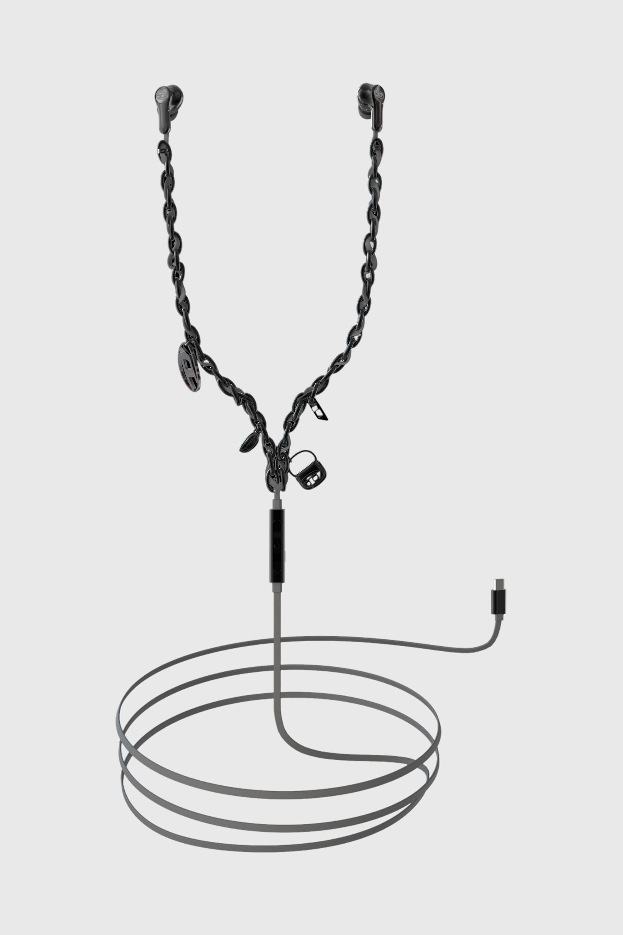 Black wired earbuds and charms by Diesel
