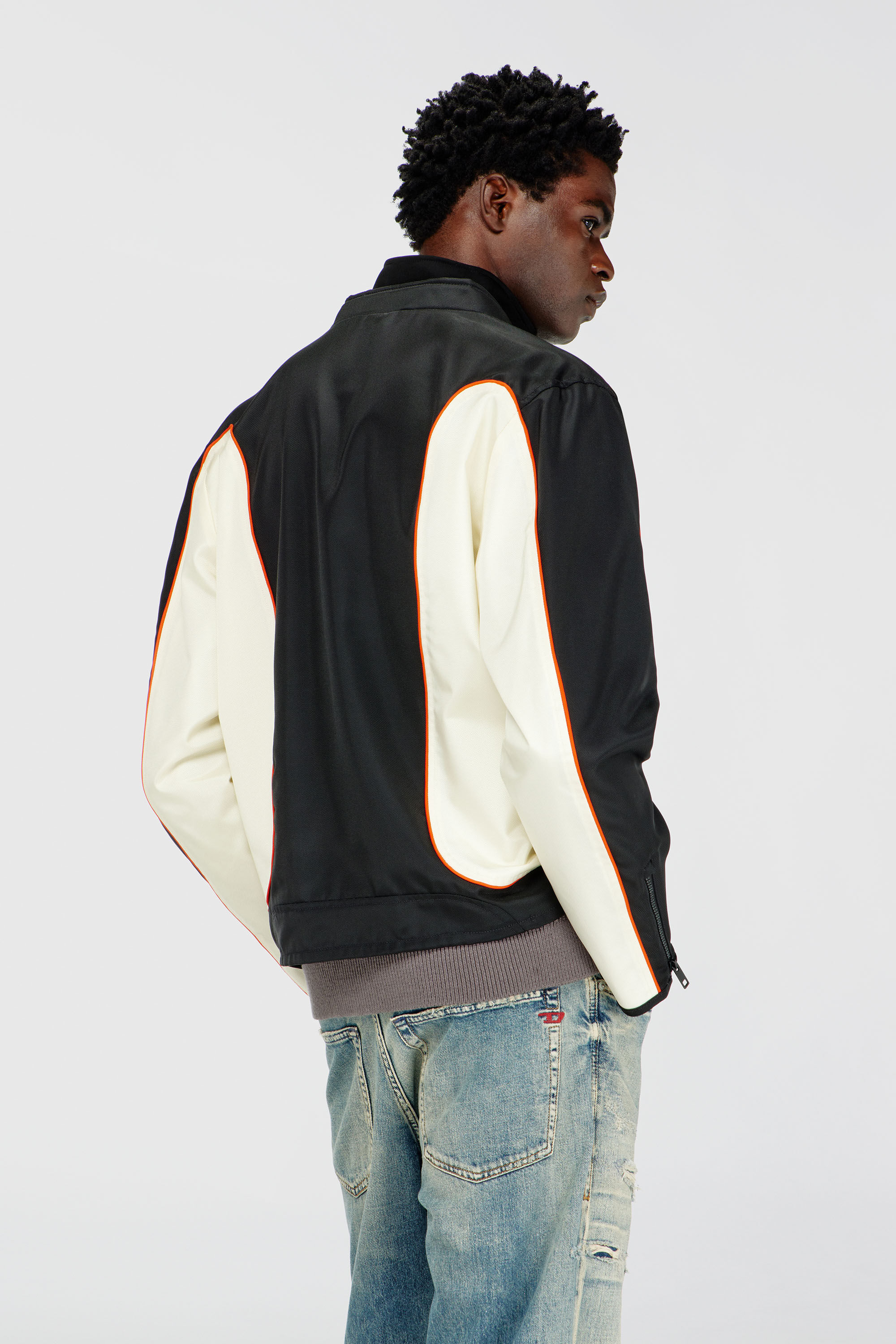 Men's Nylon jacket with color block and piping details