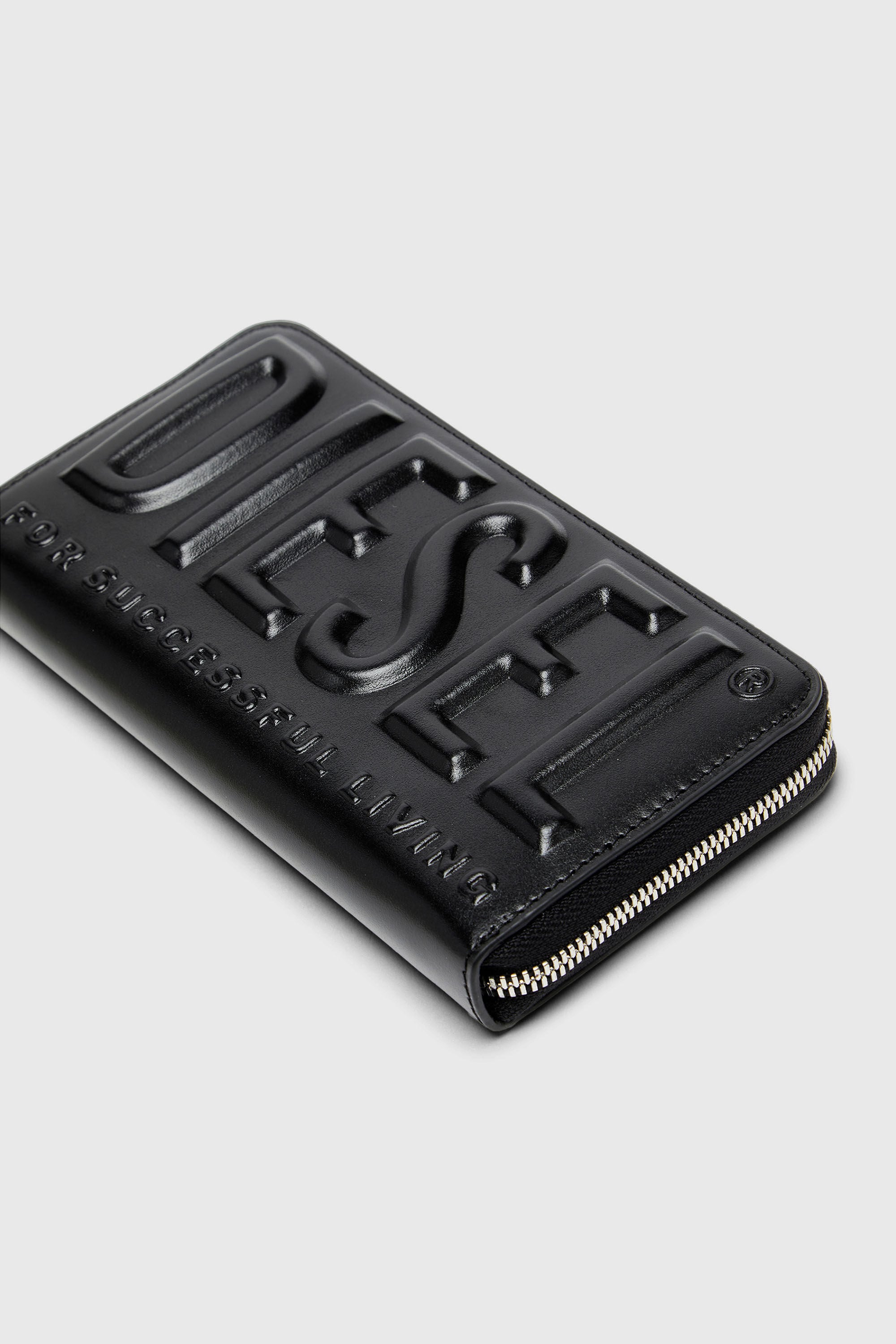 Men's Long zip wallet in logo-embossed leather | Black | Diesel US