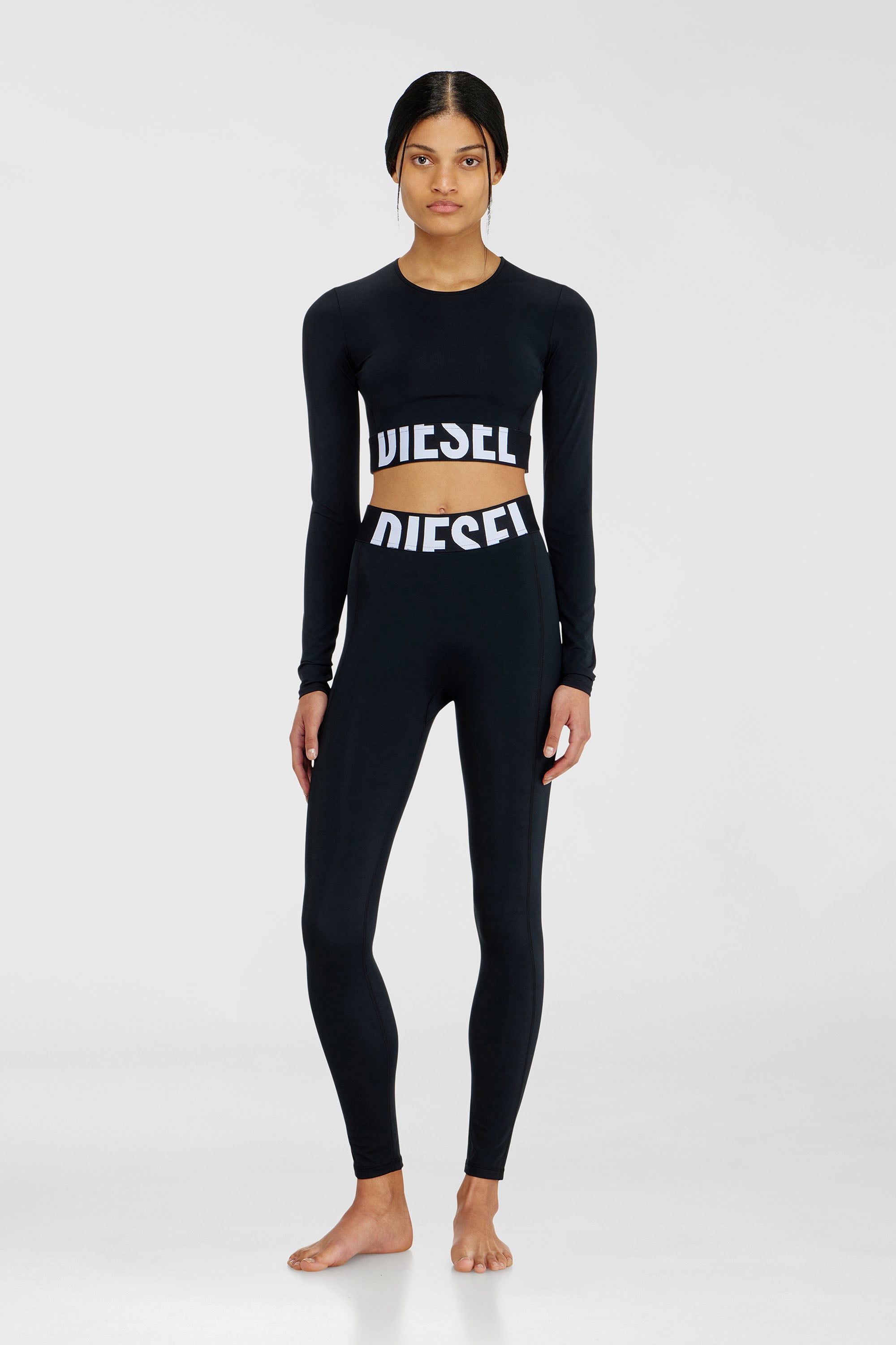Diesel - ADELINE-D-POP, Female's Microfibre leggings with cut-off logo in Black - 1