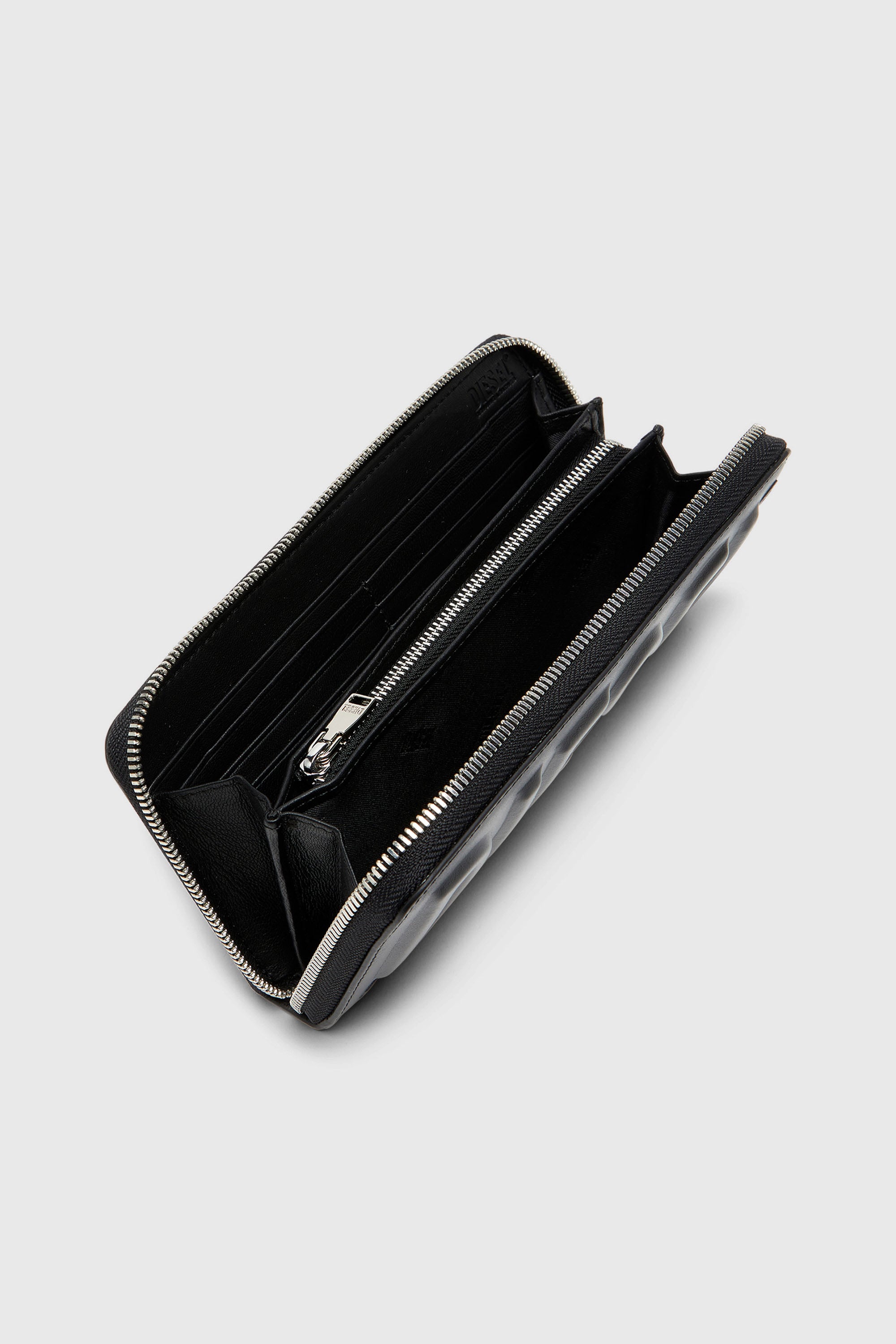 Men's Long zip wallet in logo-embossed leather | Black | Diesel US
