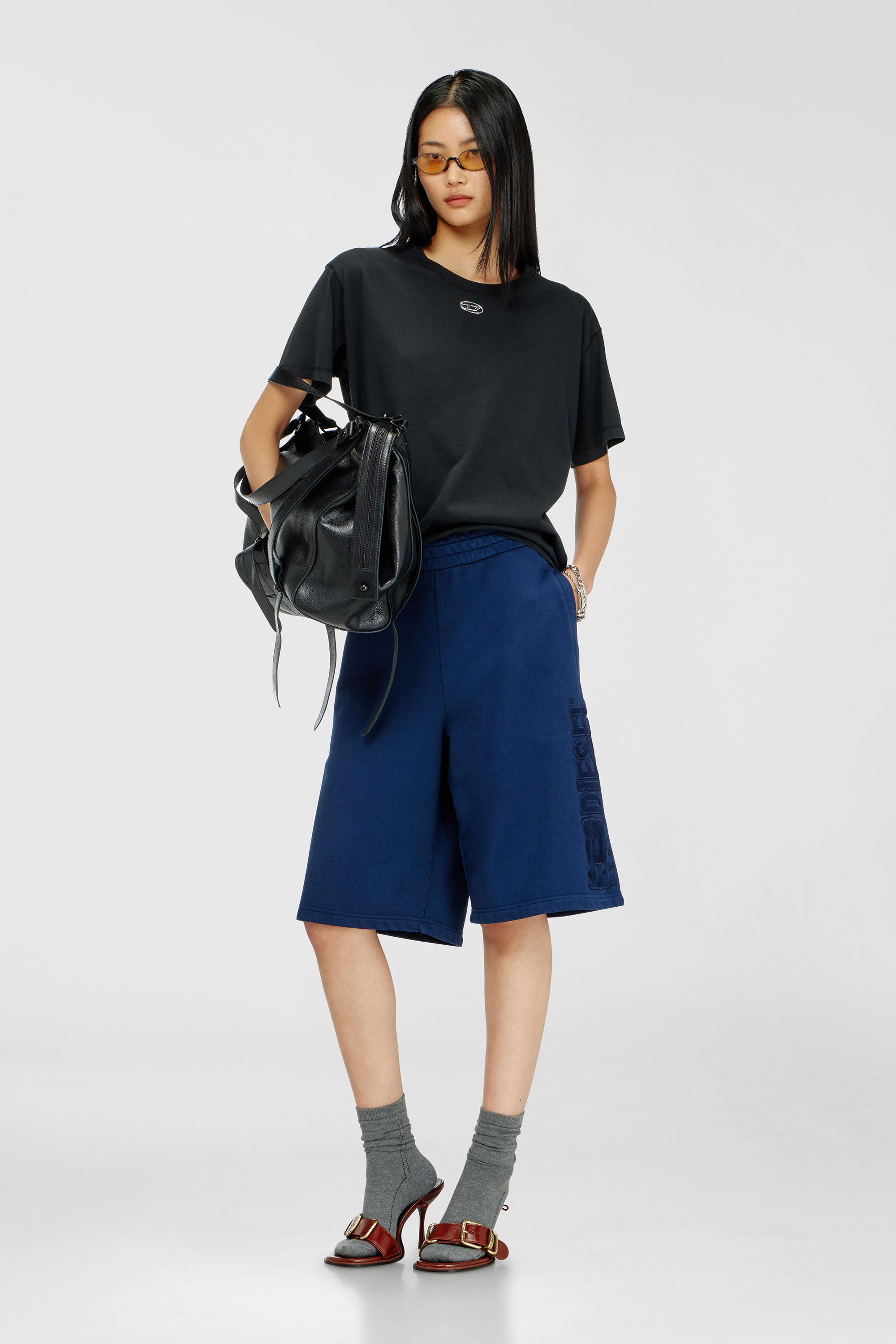 Diesel - T-NORMY-OD-S1, Female's Cotton T-shirt with metallic Oval D in Black - 1