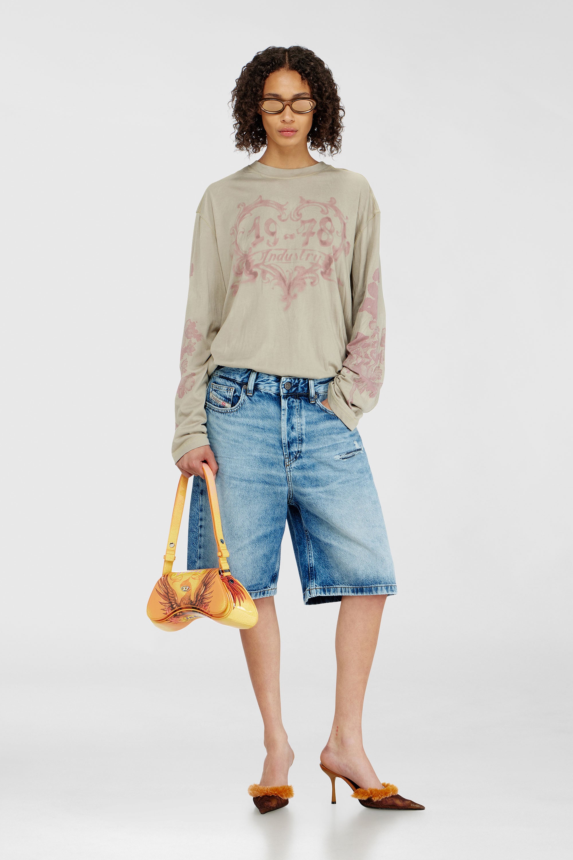 Diesel - DE-SIRE-SHORT, Female's Relaxed shorts in fluid denim with abrasions in Light Blue - 1