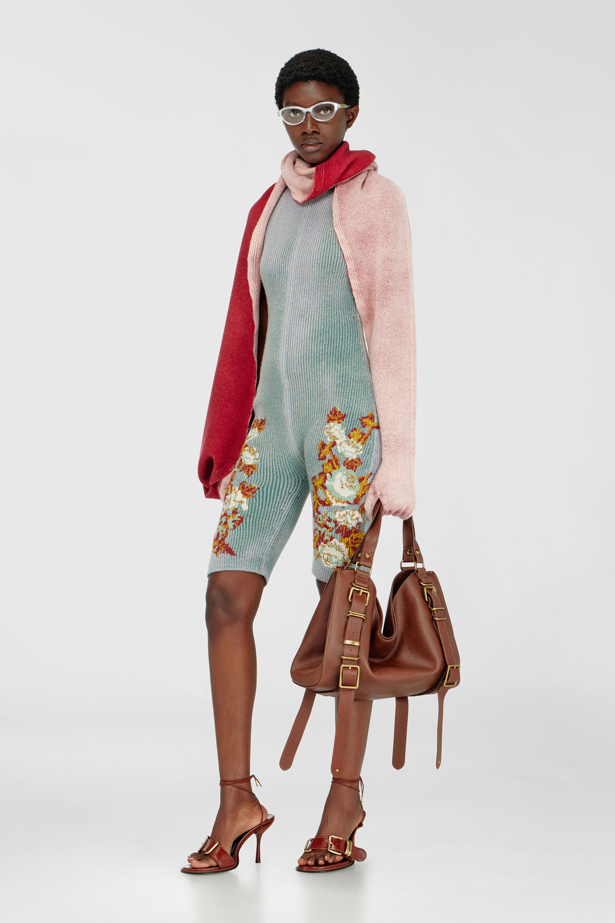 Knitted playsuit with floral motif