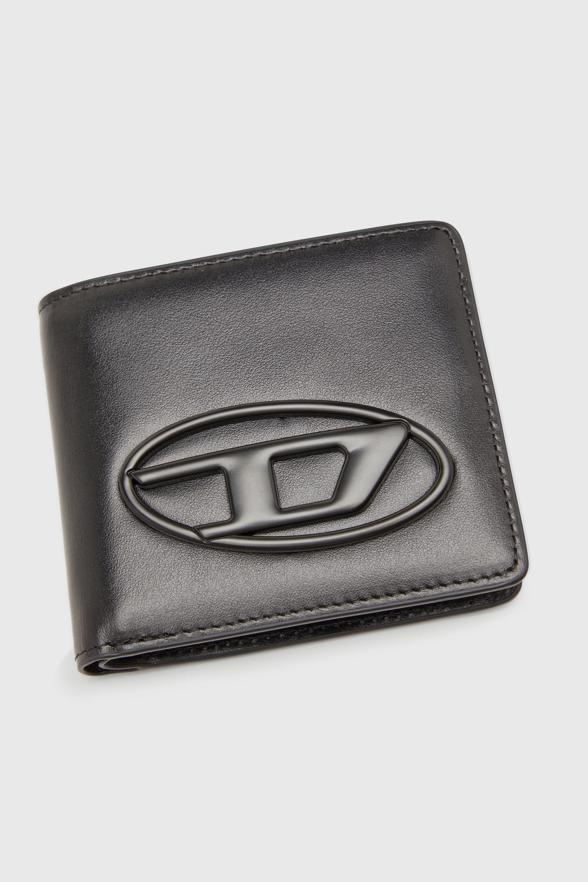 Women's Bi-fold wallet in leather | Black | Diesel {{Country}}