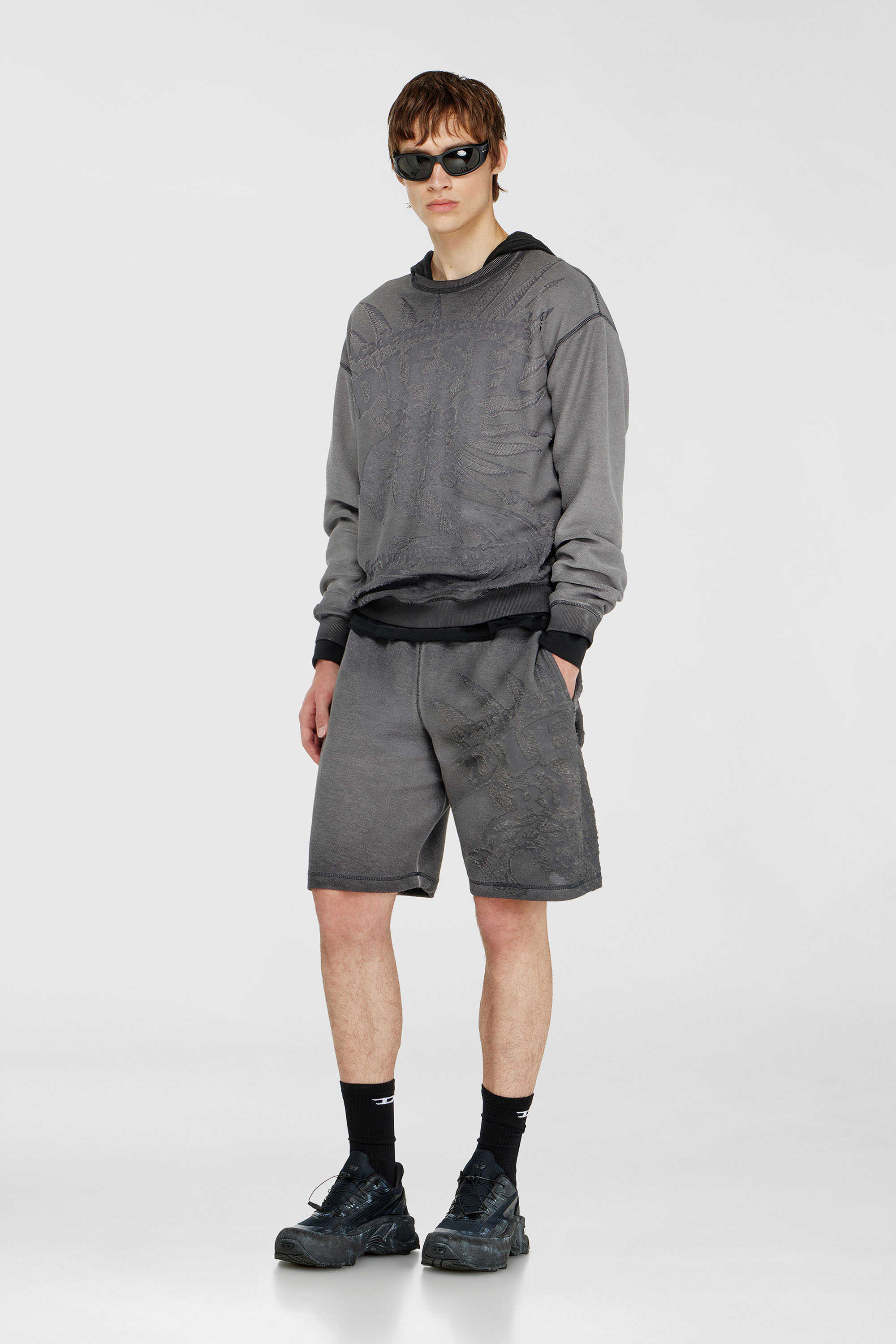 Short pants avec motifs d&eacute;vor&eacute;