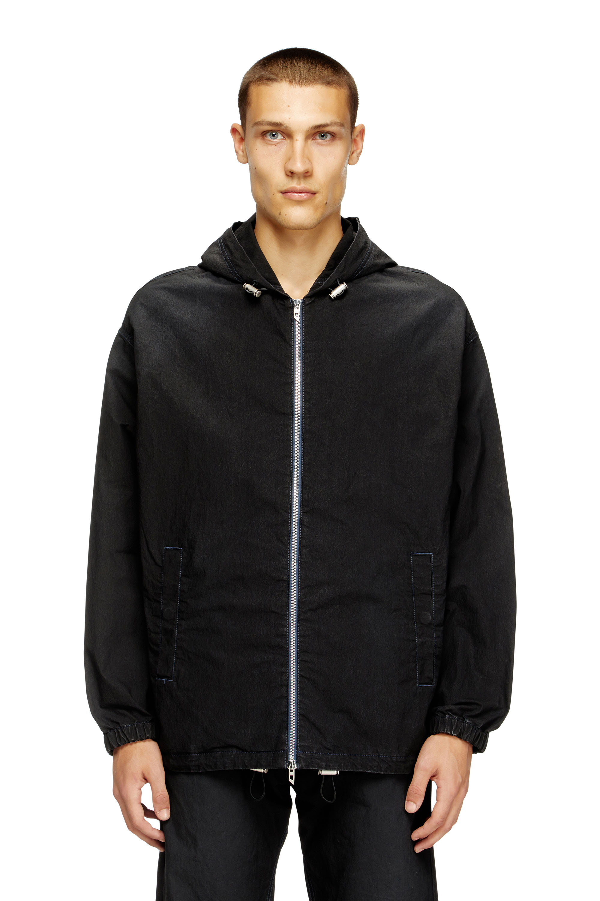 Diesel - D-WYNNY JOGG, Veste technique à capuche en tissu JoggJeans Homme in Noir - 1