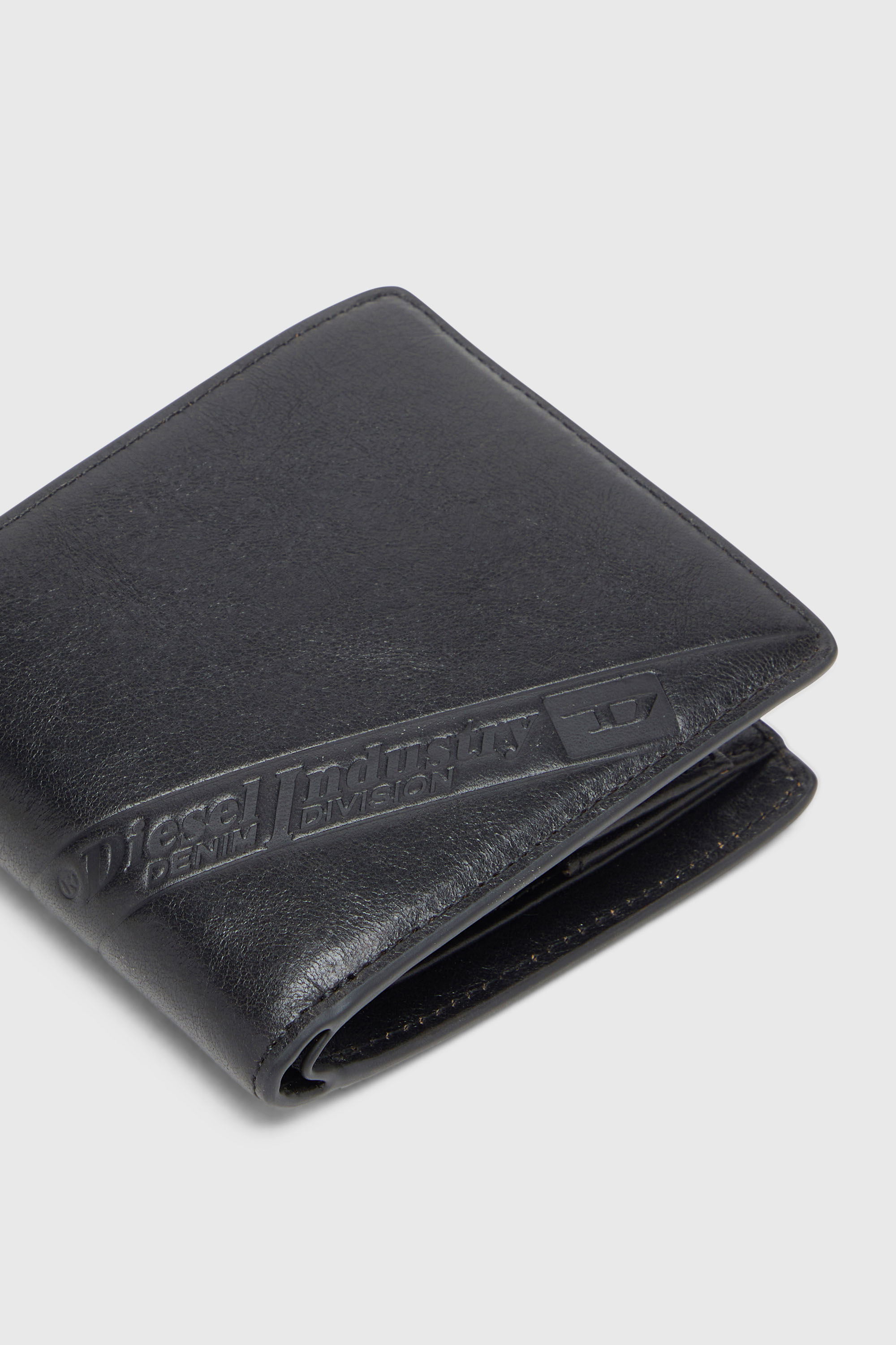 Men's Bi-fold leather wallet with embossed logo | Black | Diesel US