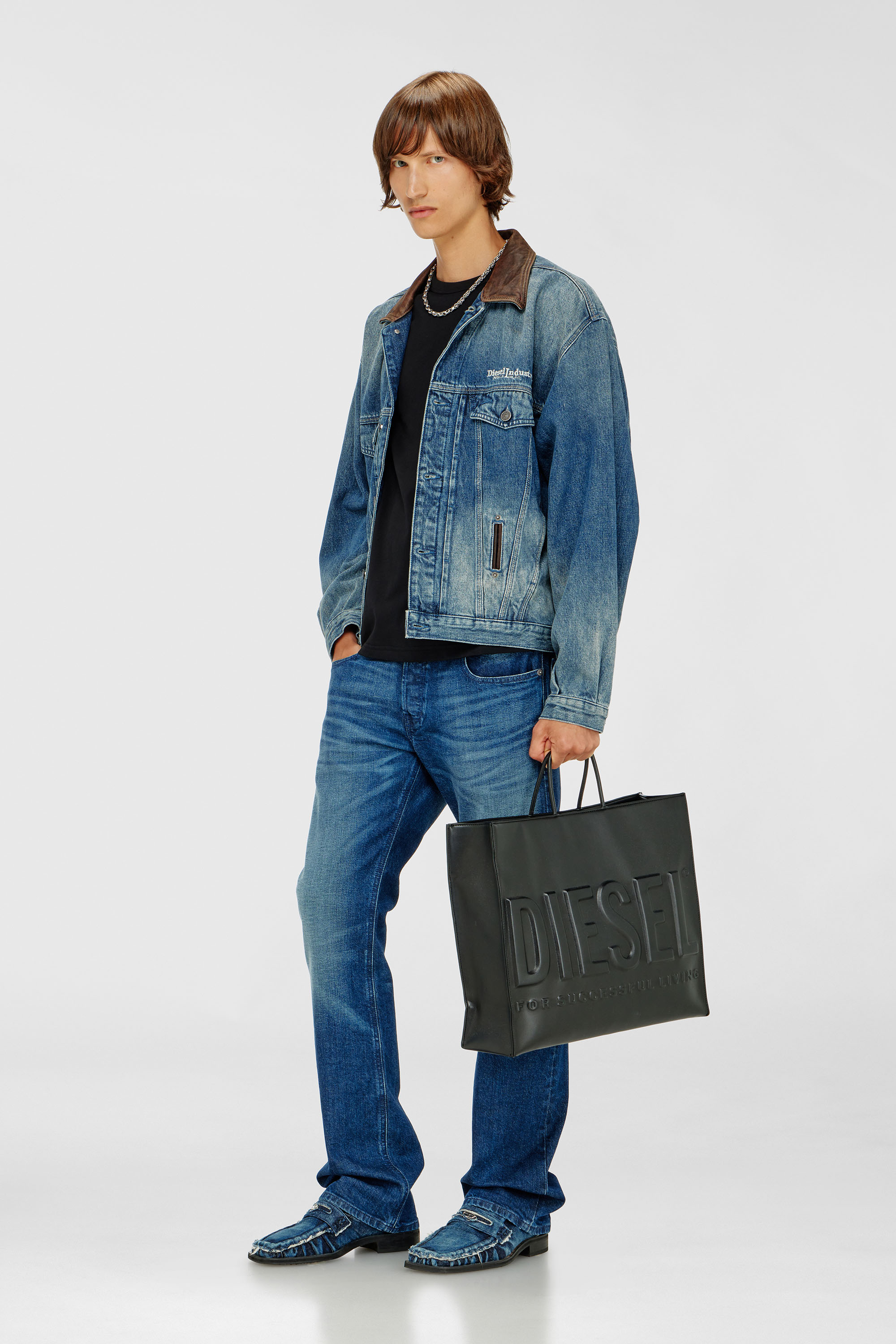 Denim trucker jacket with contrast leather trims
