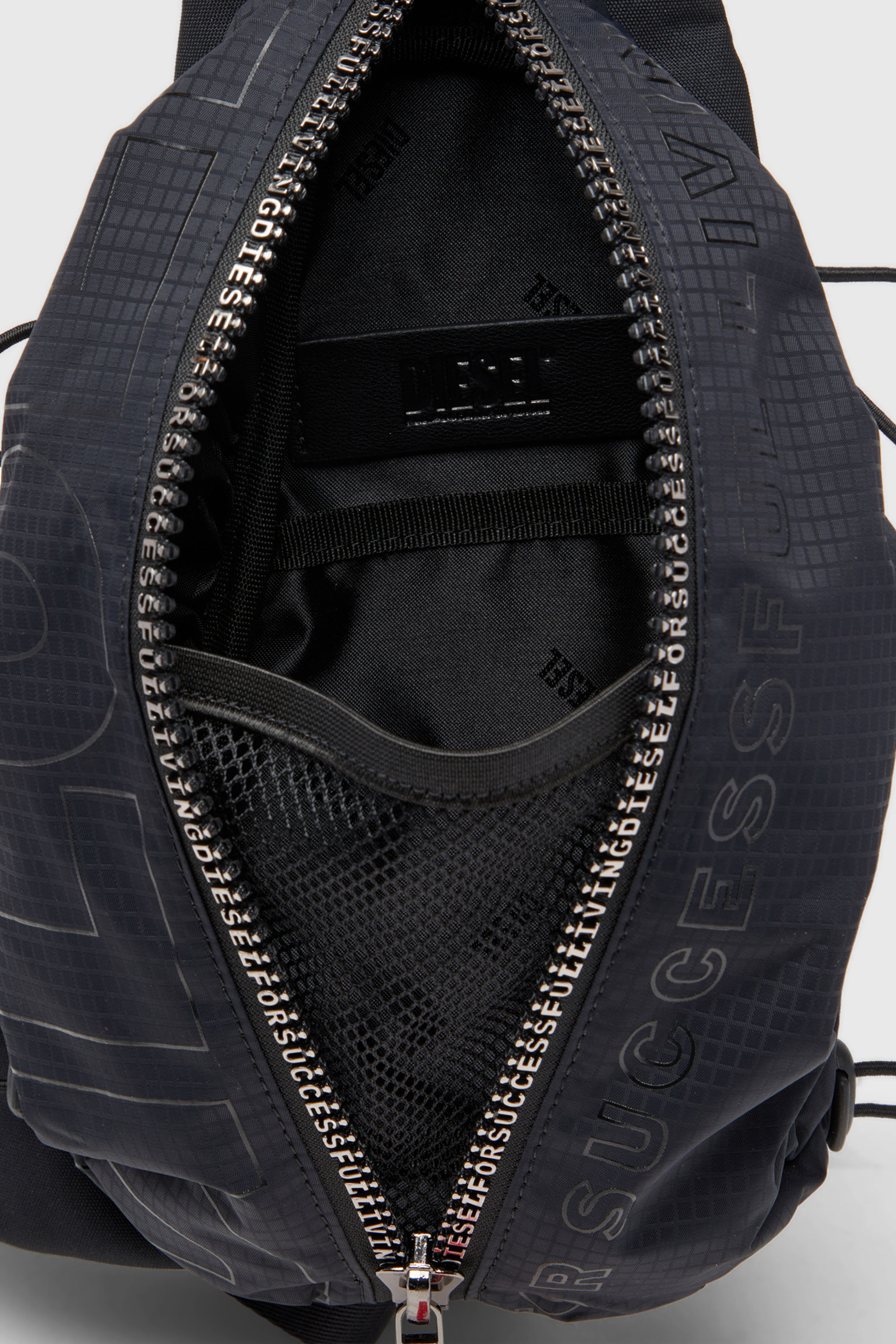 Men's Zip-D-Sling bag in check-jacquard shell | Black | Diesel US