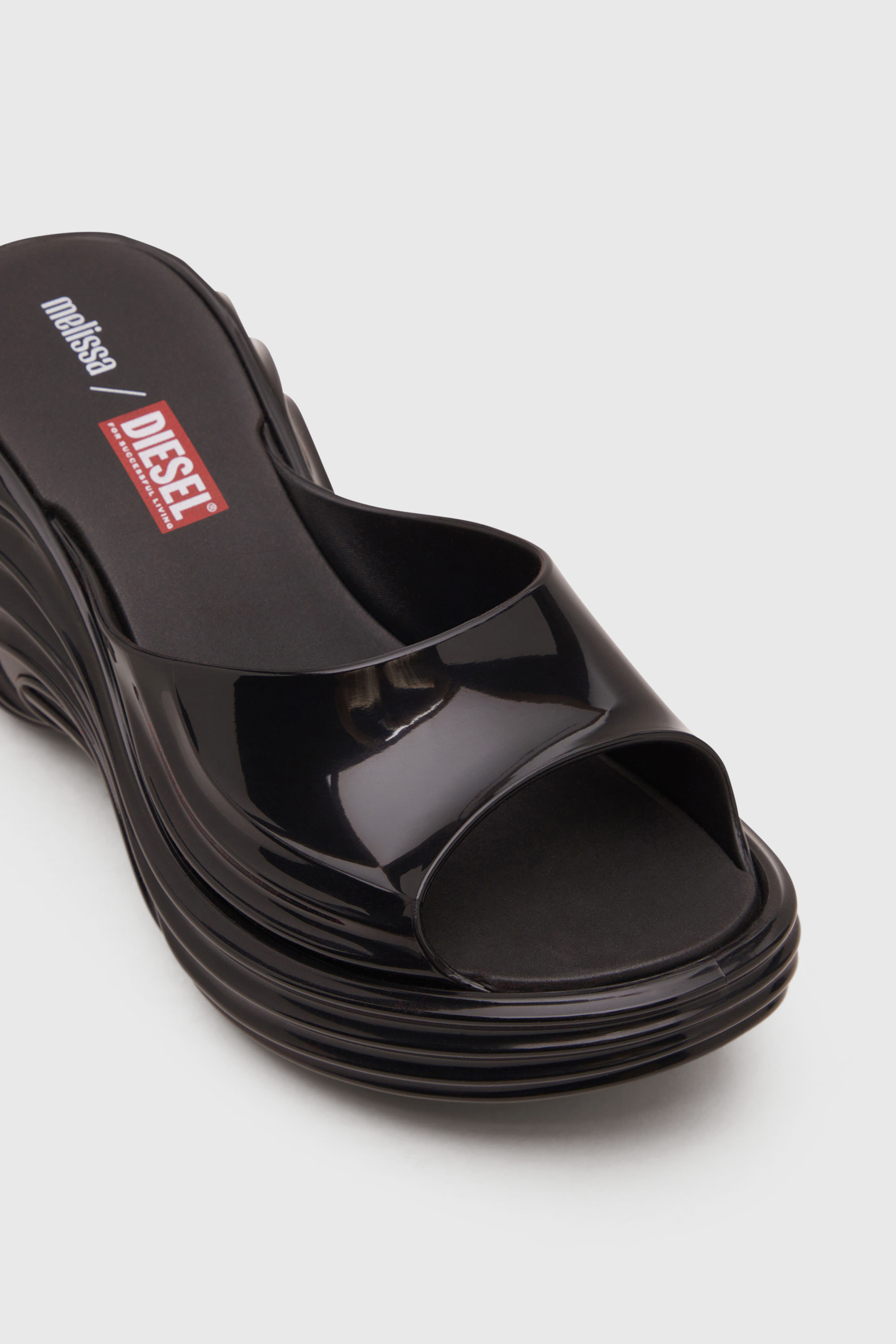 Women's Platform mule in Melflex® | Black | Diesel {{Country}}