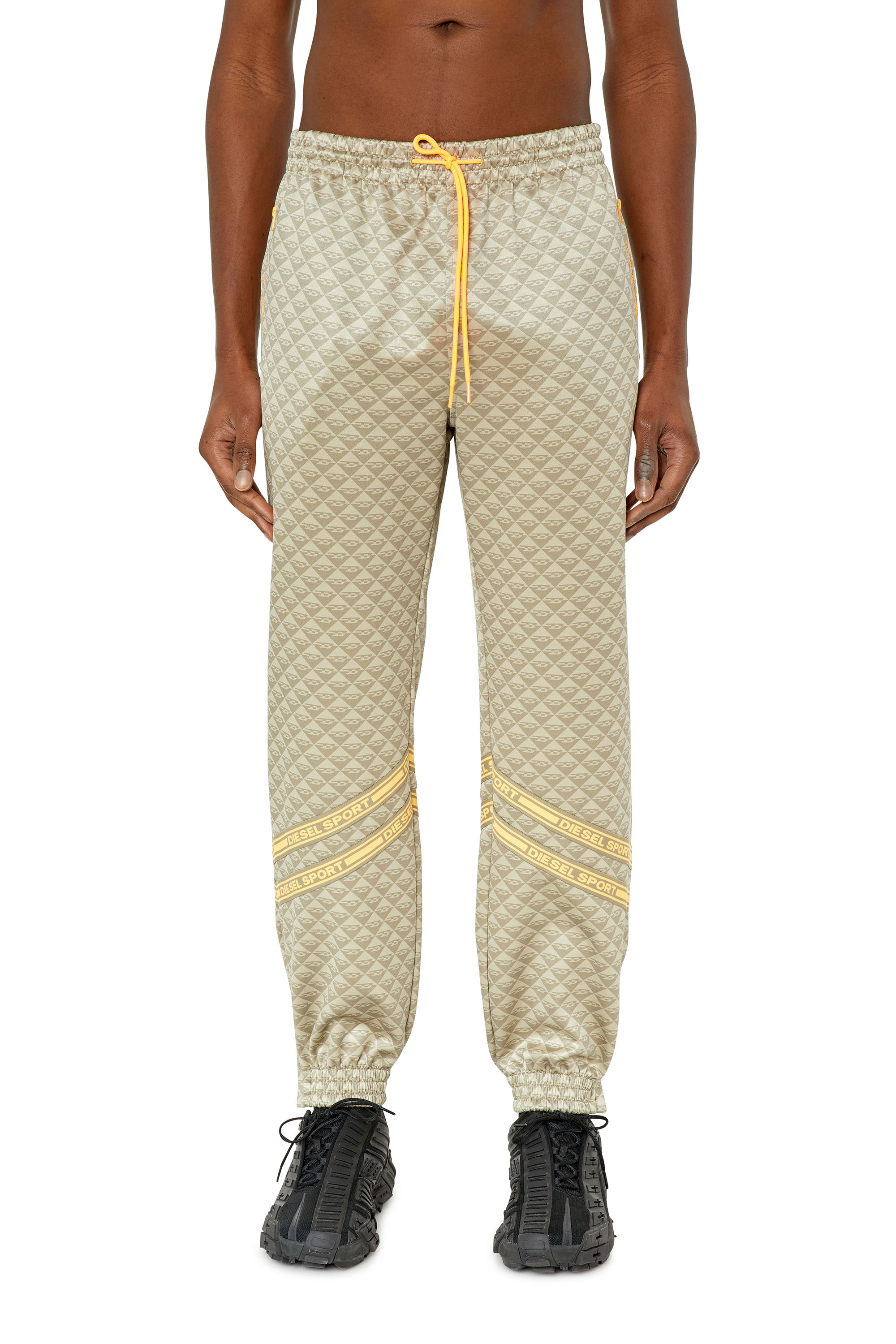 AMSB-FLAVIE-HT30 Man: Monogram track pants with logo tape | Diesel