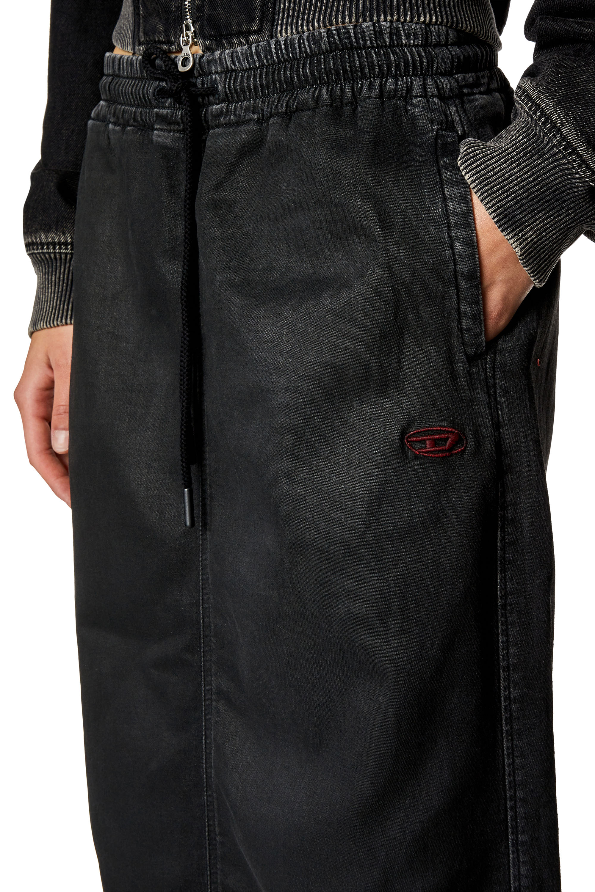 Women's Skirt in coated denim | Black | Diesel