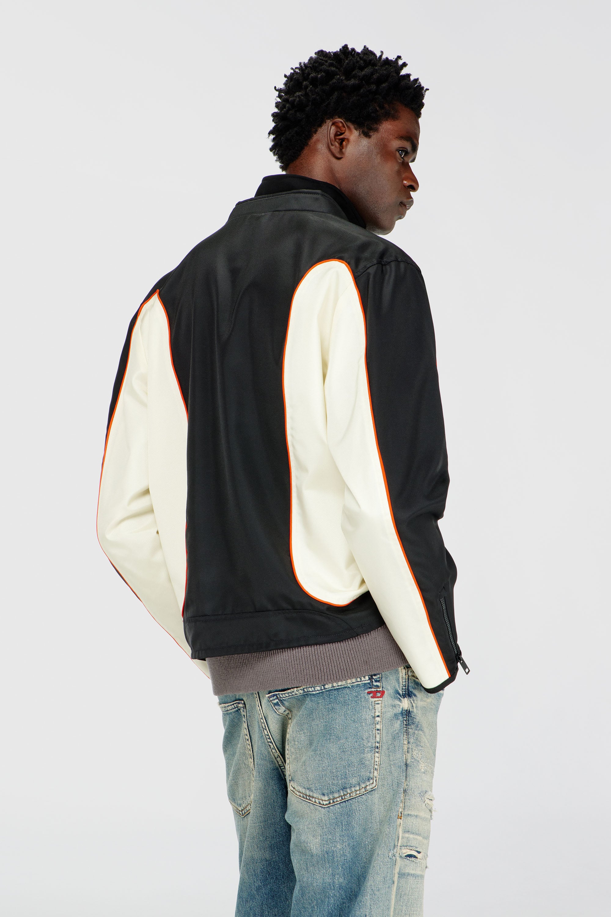 Men's Nylon jacket with color block and piping details