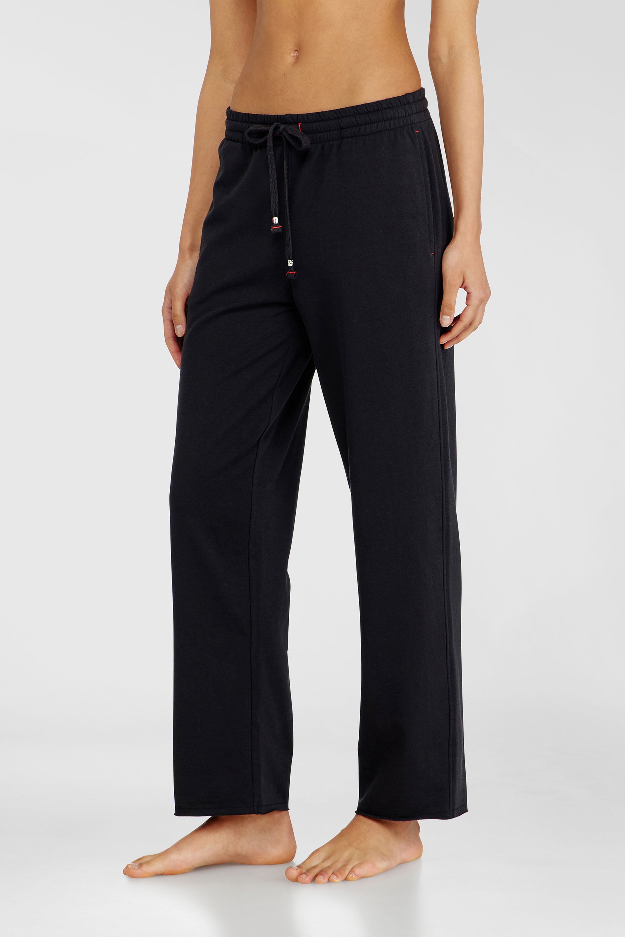 Diesel - INDRA-D-CORE, Pantal&oacute;n de ch&aacute;ndal afelpado con bajos al corte Mujer in Negro - 1