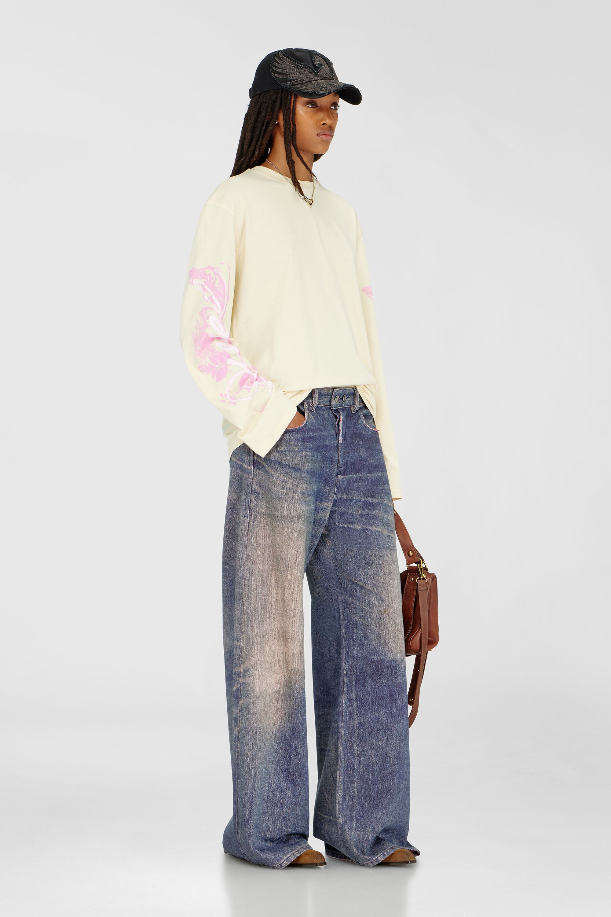 Diesel - T-HILARY-LS-AA3, Female's Long-sleeve T-shirt with graphic prints and crystals in Yellow - 2