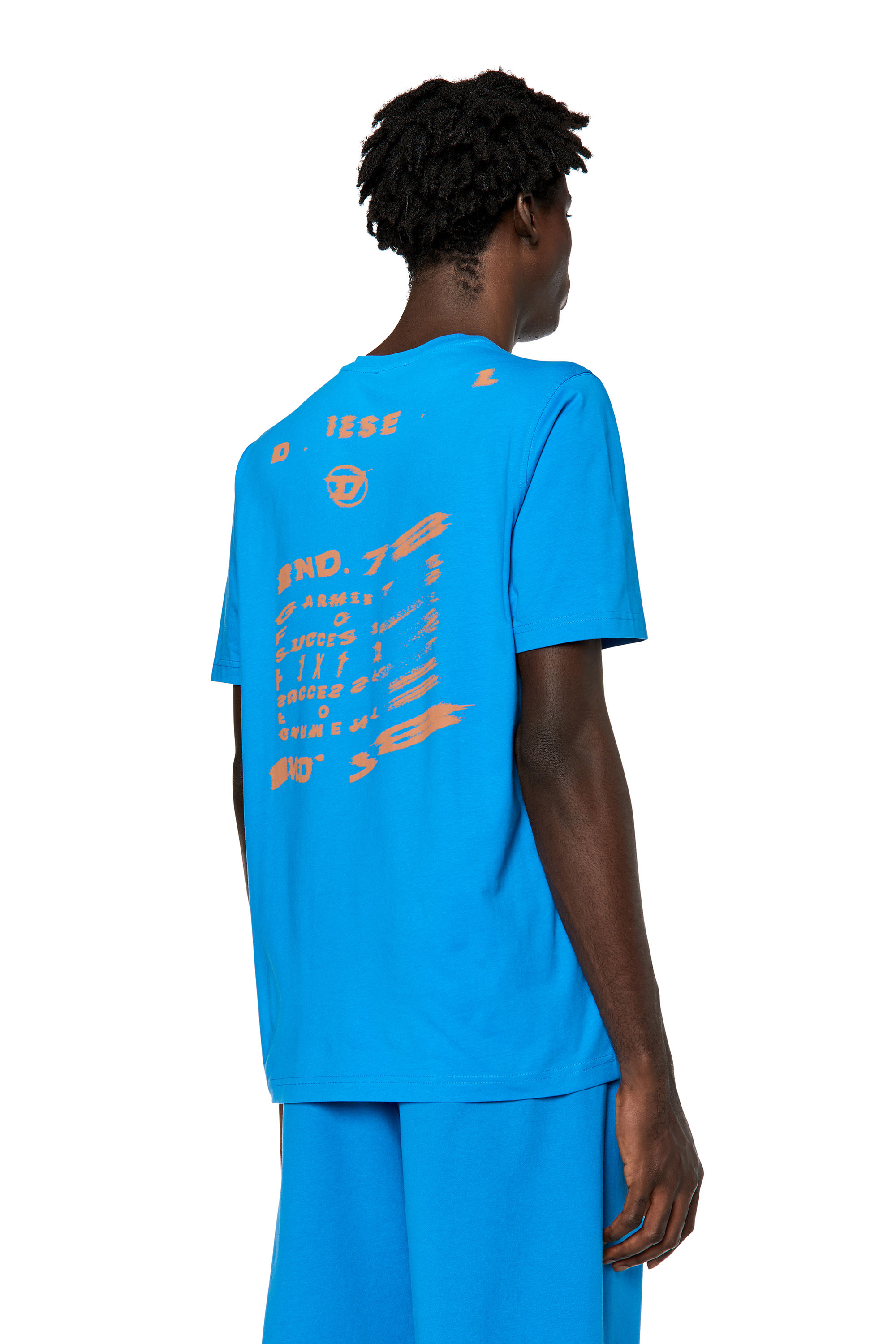 Diesel - T-JUST-G9, Man's T-shirt with distorted logo print in Blue - 5