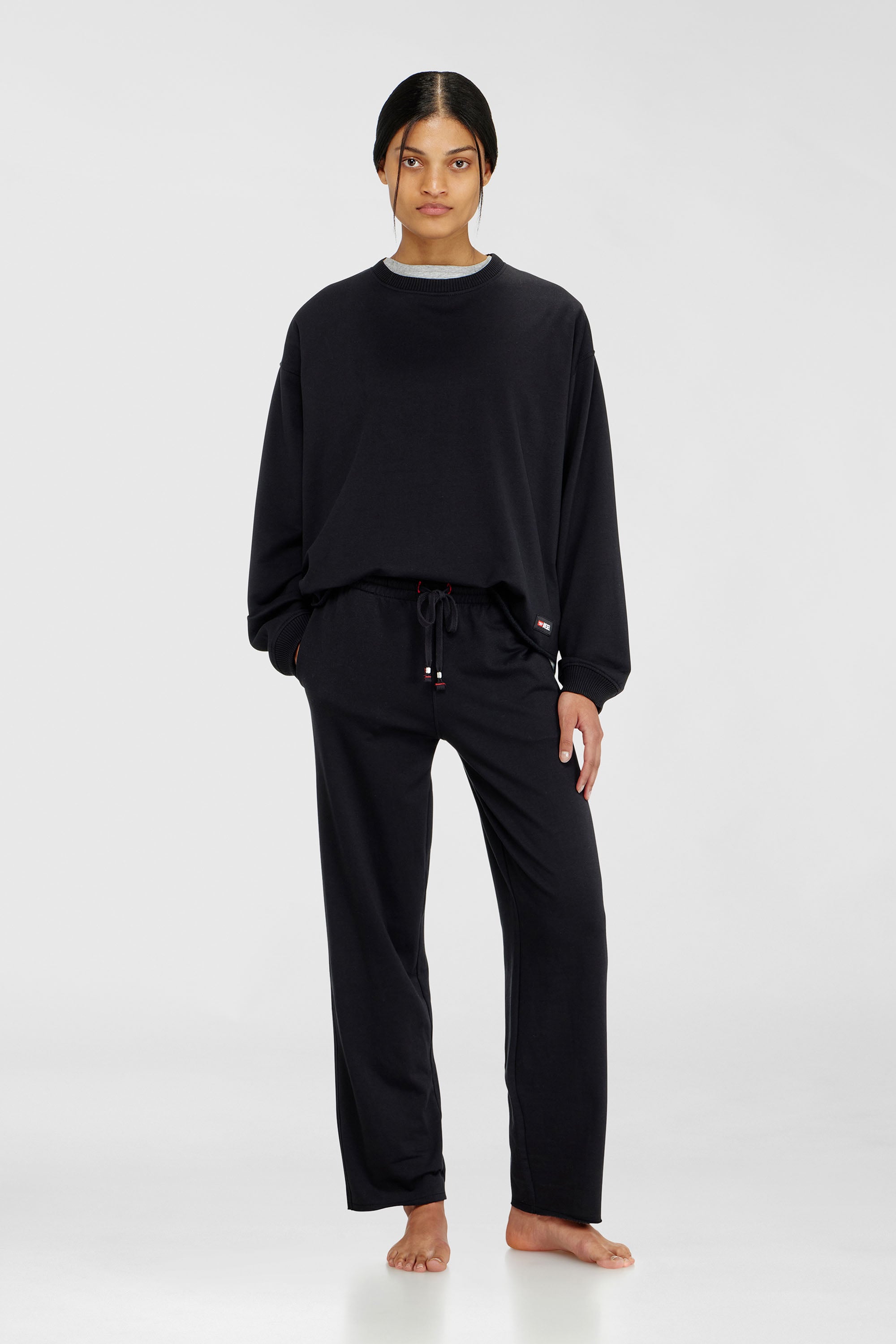 Diesel - INDRA-D-CORE, Female's Peached sweatpants with raw hems in Black - 1